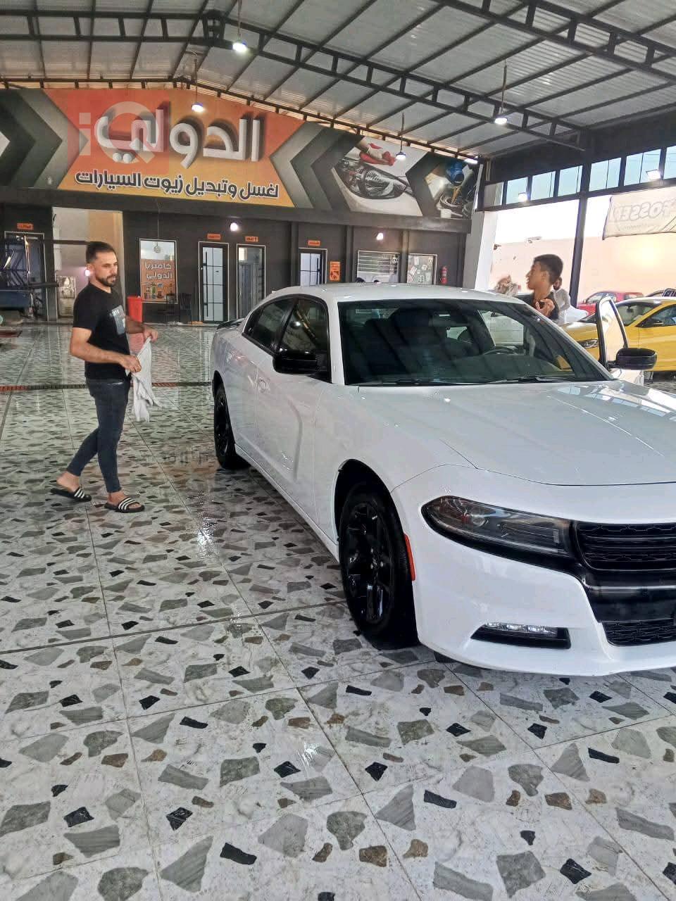 دۆج چارجەر